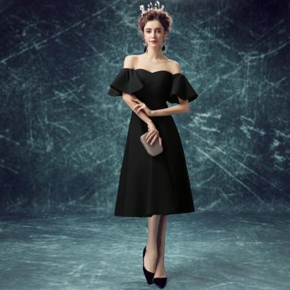 Classic Black Tea-length Dress With Ruffle Sleeves..