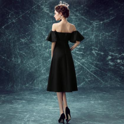 Classic Black Tea-length Dress With Ruffle Sleeves..